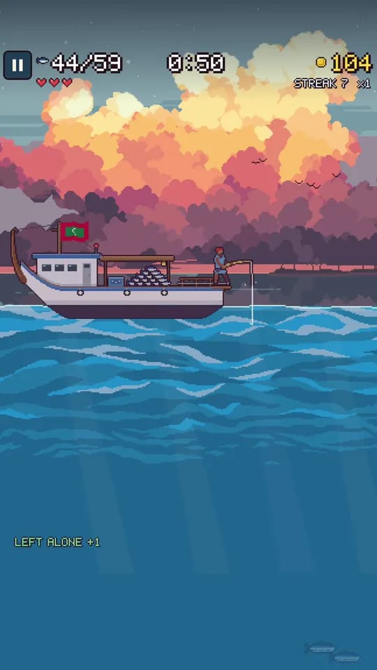 A school of fish beside the boat at sunset
